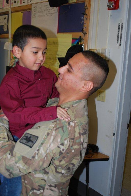 Father returns from Afghanistan and surprises sons