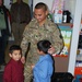 Father returns from Afghanistan and surprises sons