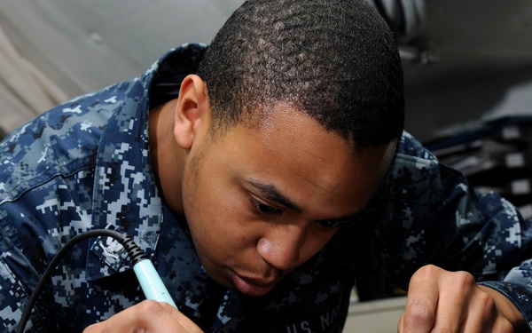 USS Carl Vinson sailors at work