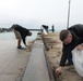 Volunteers help clean up Henoko Beach