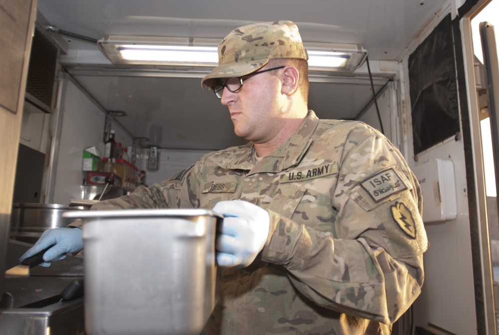 Cook provides morale to fellow soldiers