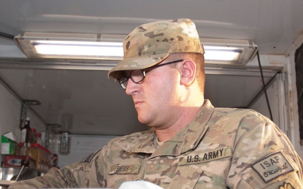 Cook provides morale to fellow soldiers