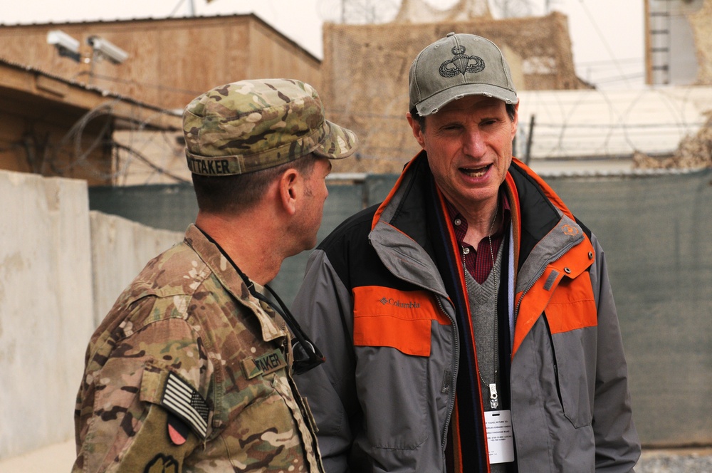 Oregon Senator Wyden speaks with a Regional Command (South) constituent