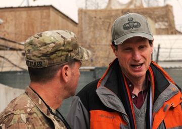 Oregon Senator Wyden speaks with a Regional Command (South) constituent