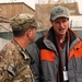 Oregon Senator Wyden speaks with a Regional Command (South) constituent