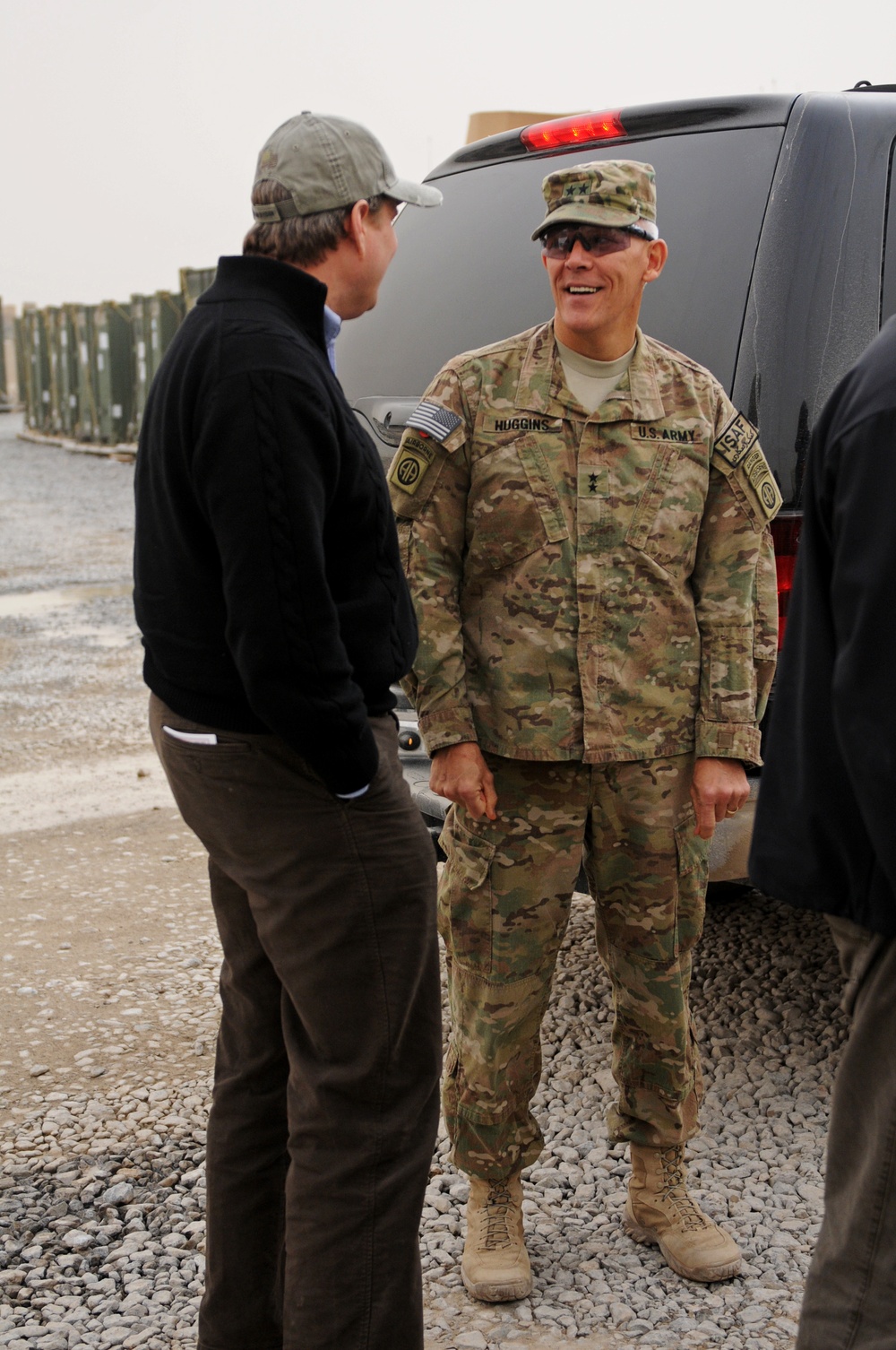 Maj. Gen. Huggins shares a laugh with Representative Huizenga on Kandahar Airfield