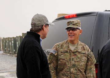Maj. Gen. Huggins shares a laugh with Representative Huizenga on Kandahar Airfield