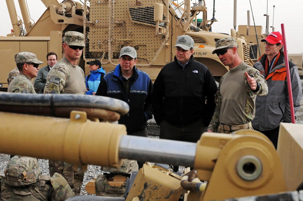 US senators and congressman learn about mine-rollers from Regional Command (South) soldiers