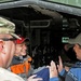 US senators share some laughs in the back of a Stryker in Regional Command (South)