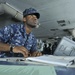 USS Abraham Lincoln sailor charts a course