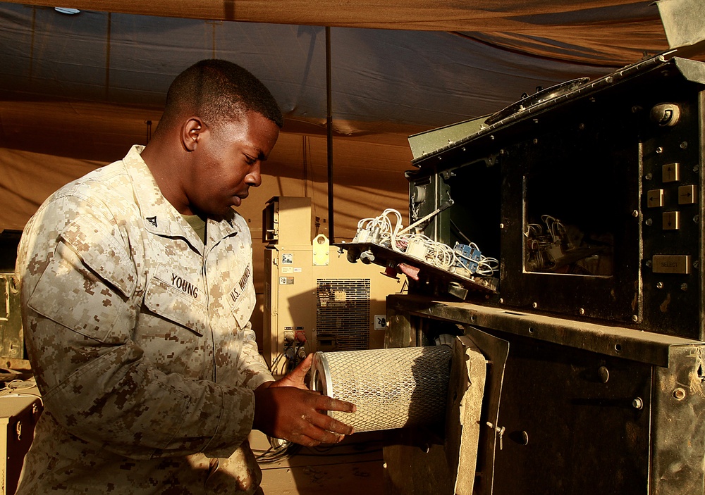 Atlanta Marine follows in father’s footsteps, powers Marines in Afghanistan