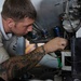 USS Carl Vinson's sailor perform maintenance