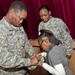 Family in no short supply as staff sergeant becomes an officer