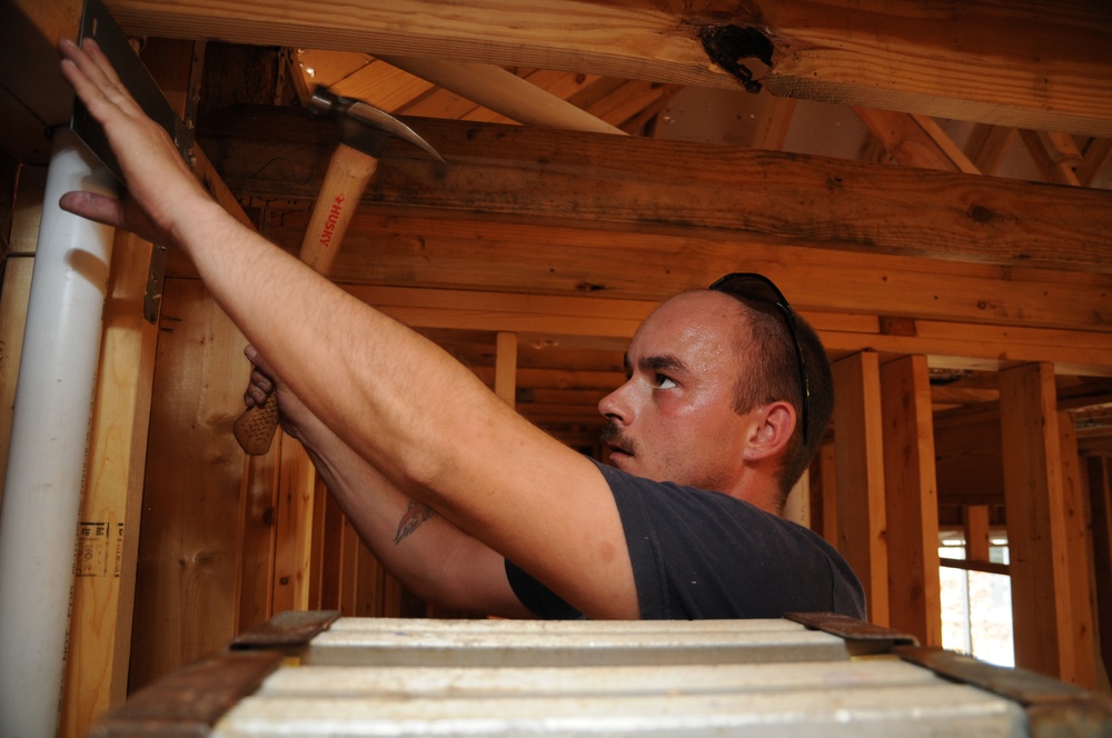 Gulfport Seabee volunteers build for charity