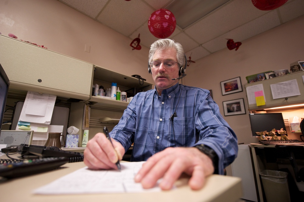 JBER telephone operators connect calls, people