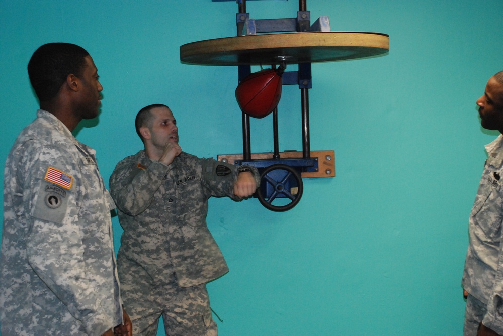 Members of Joint Task Force Empire Shield test out some new fitness equipment