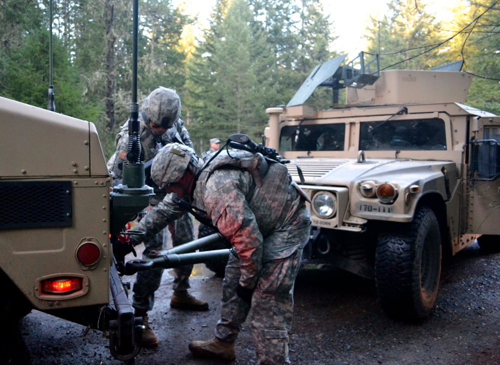 Soldiers prepare to tow