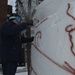 Navy Misawa snow sculpture team begins shaping &quot;The Lone Sailor&quot;