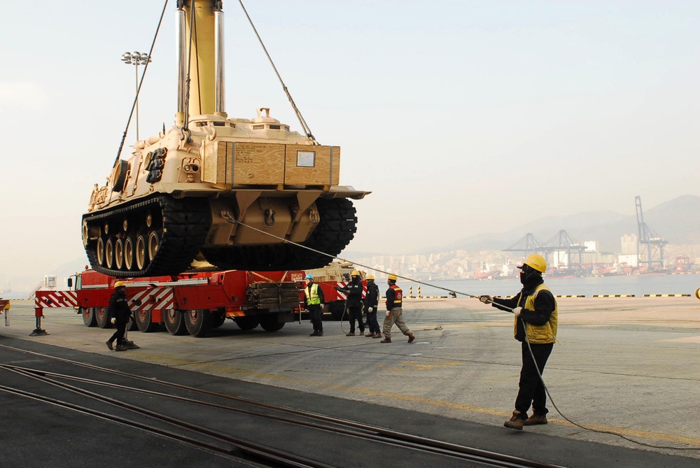 Flat-bottomed boat ‘Barge’ transports M88A1 recovery vehicles