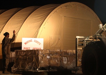 Rain, snow, dead of night finds postal Marines working