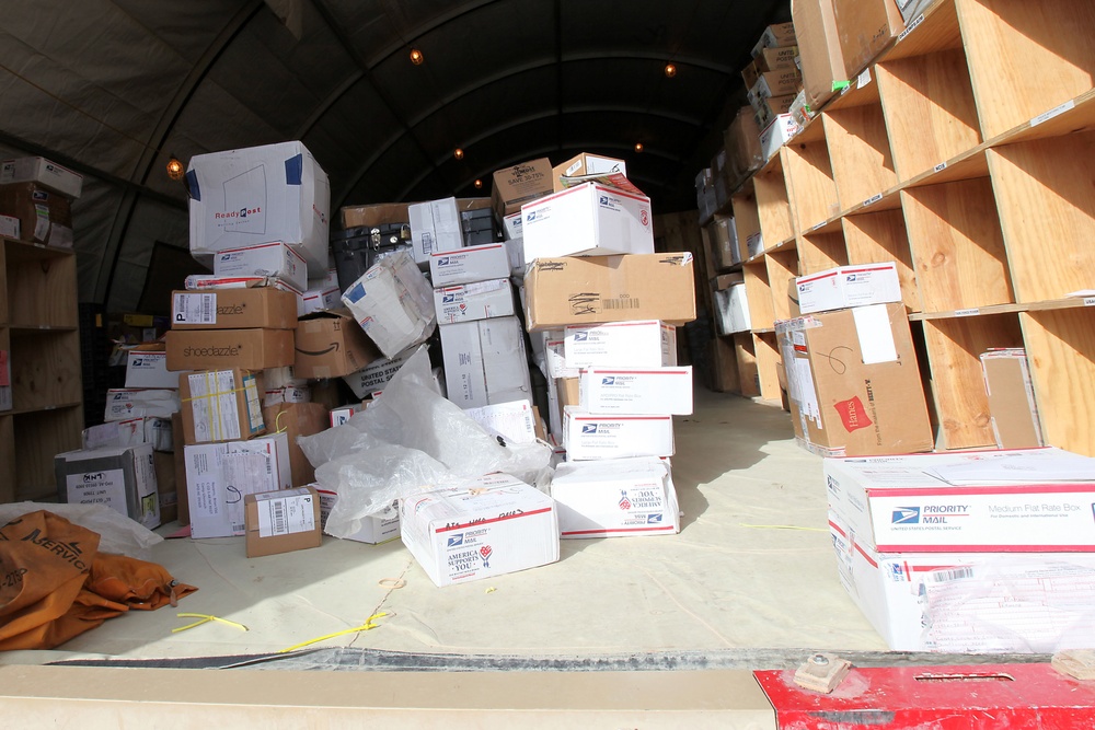 Rain, snow, dead of night finds postal Marines working