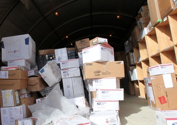 Rain, snow, dead of night finds postal Marines working