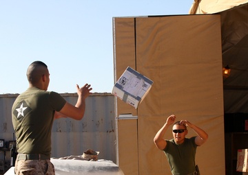 Rain, snow, dead of night finds postal Marines working