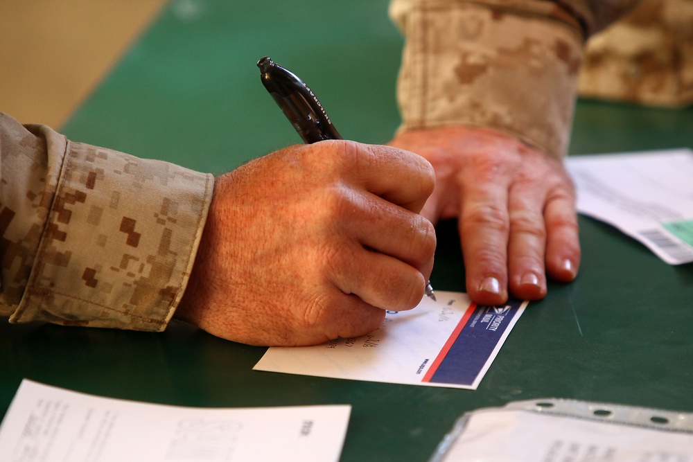 Rain, snow, dead of night finds postal Marines working