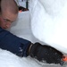 The Navy Misawa snow sculpture team get detail oriented