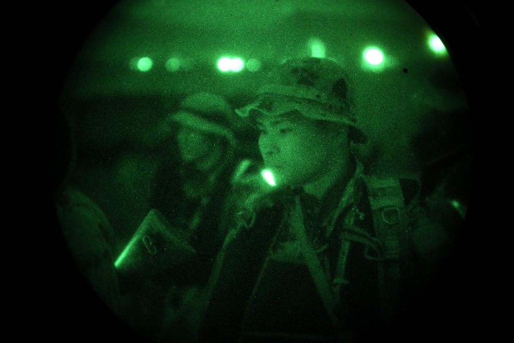 Marines, Japanese swim to the shore under stealth of night
