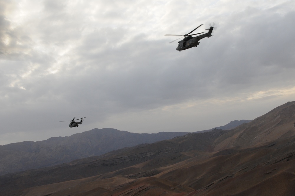ISAF helicopters fly 4-ship patrol over Badghis
