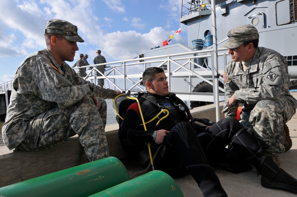 Army engineer divers conduct patching mission