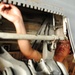 Maintainers work on aircraft