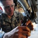 Maintainers work on aircraft