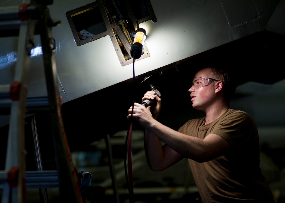USS John C. Stennis sailors at work