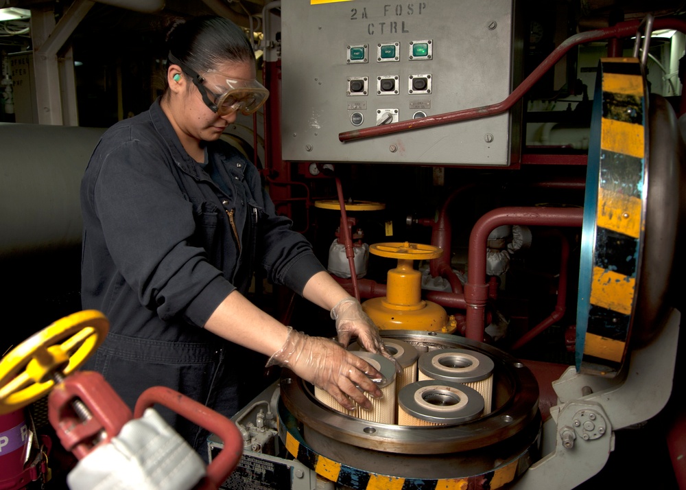 USS James E. Williams sailor does maintenance