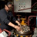 USS James E. Williams sailor does maintenance