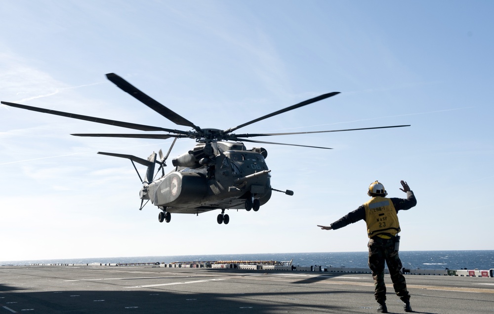 Sailor directs MH-53E Sea Dragon for landing