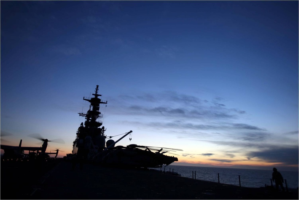 MV-22B Ospreys with Marine Medium Tiltrotor Squadron 266 prepare to take off from USS Wasp