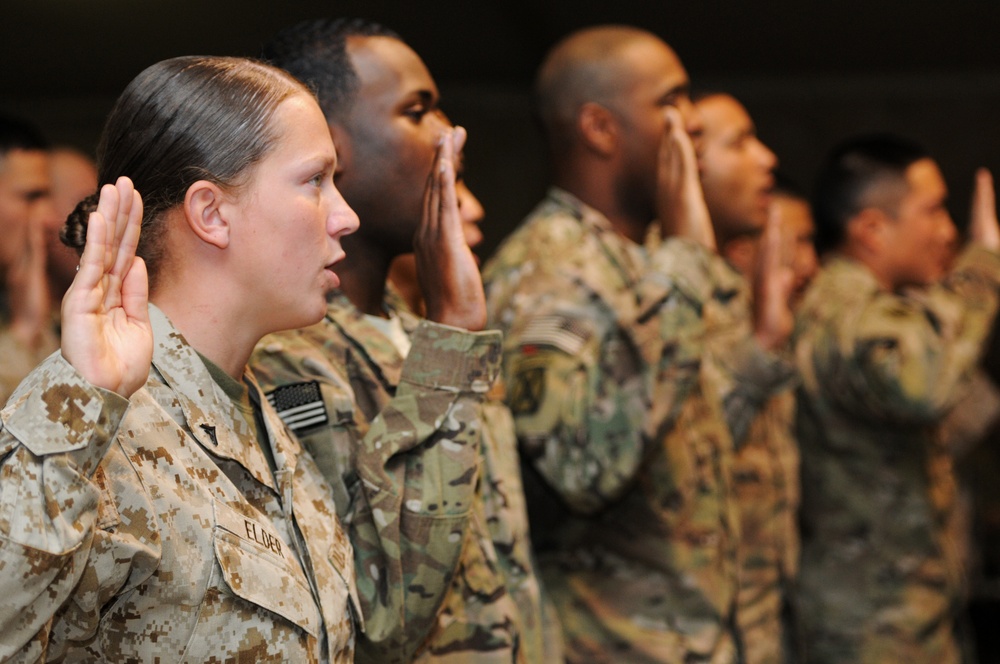 Marines, soldiers and airmen take the oath of citizenship at naturalization ceremony