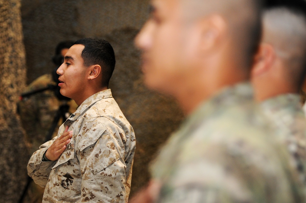 Marine leads newly naturalized service members in Pledge of Allegiance