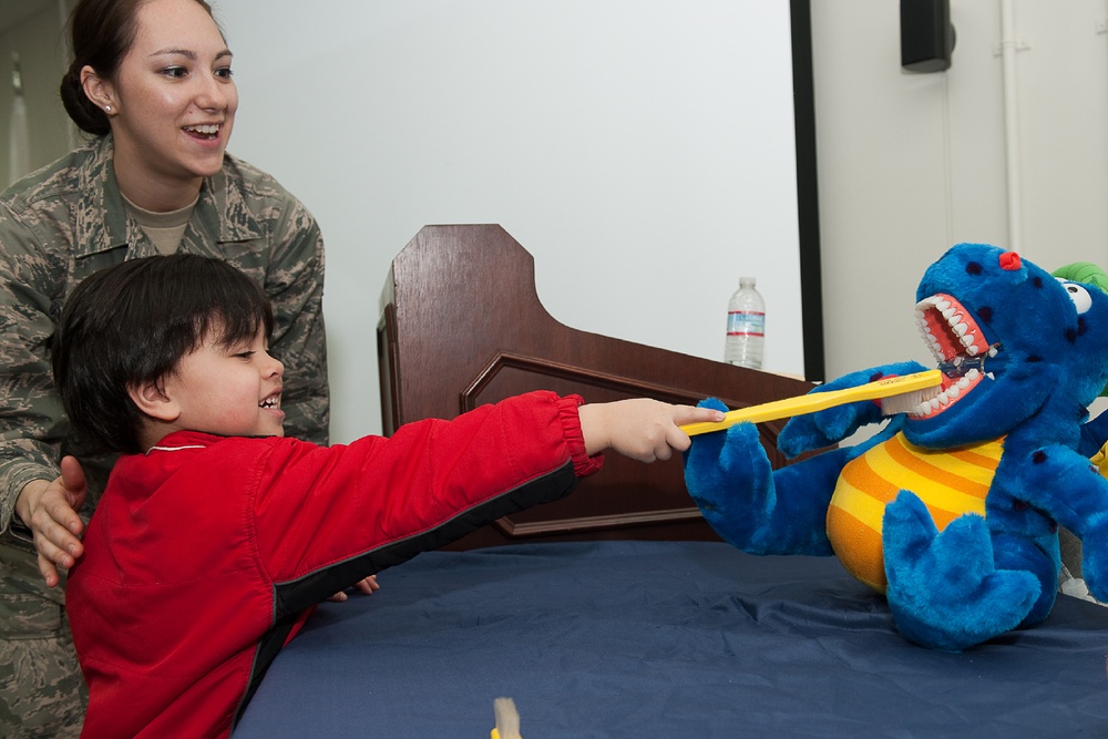 Yokota youth visit 374th DS for National Children's Dental Health Month