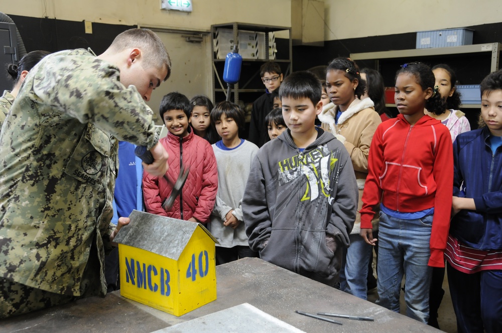 Seabee teaches students how to build