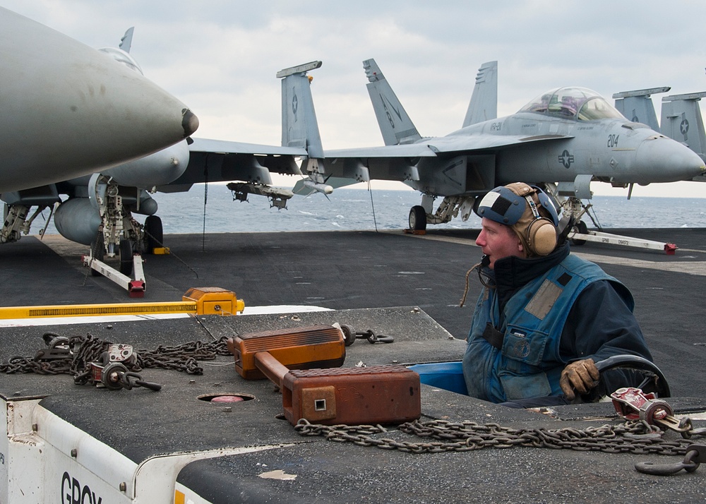 USS Enterprise moves jet