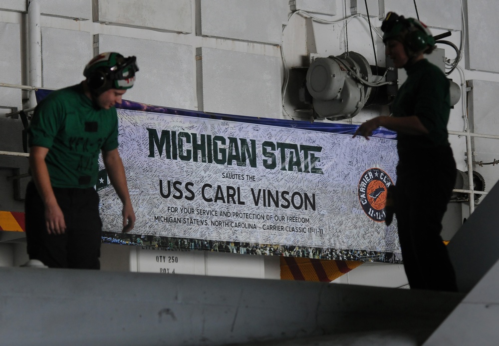 USS Carl Vinson sailors perform maintenance