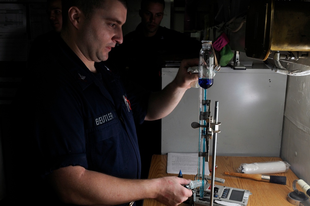 USS Carl Vinson sailor conducts water test