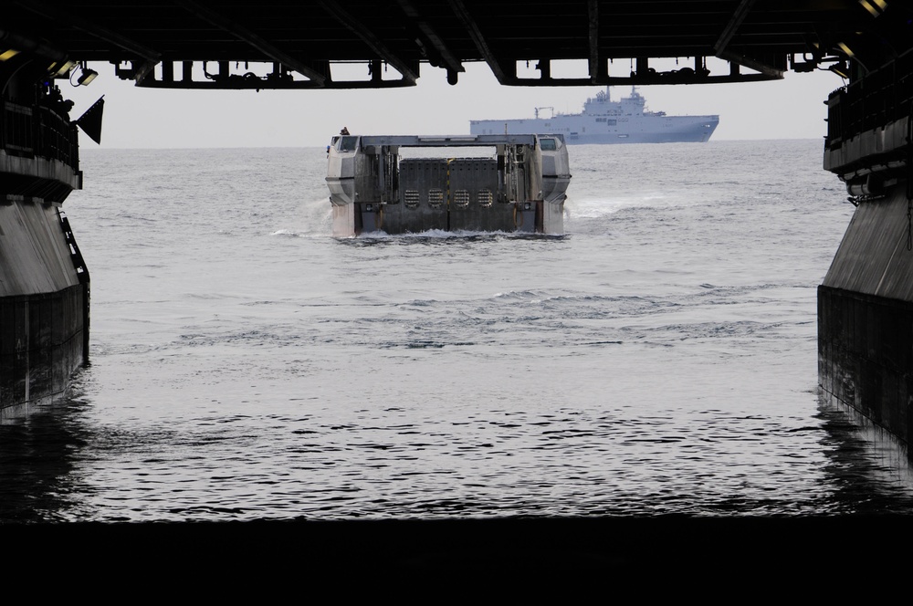 Landing catamaran pulls into USS Wasp well deck