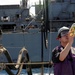 USS Momsen sailor checks fuel sample