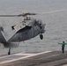 MH-60S Sea Hawk lands aboard USS Abraham Lincoln