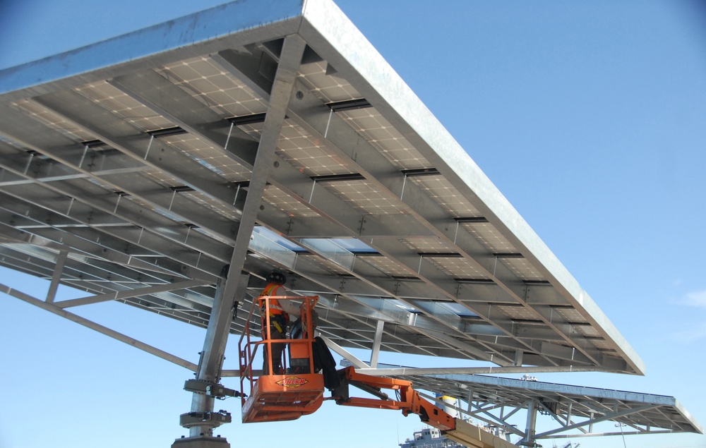 Sailor works on solar panel